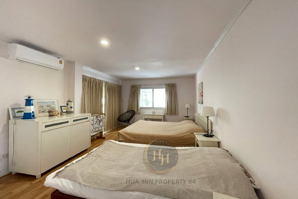 SC94699 Baan Kredsai Pranburi is a front-row beachfront condominium located approximately 20 minutes from Hua Hin, featuring a unit directly on the beach with open sea views and a high level of privacy.